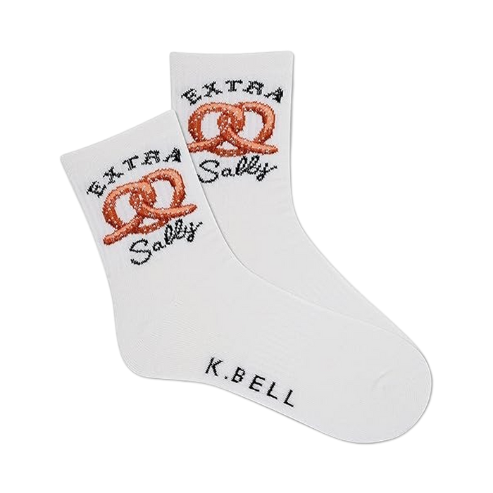 Pair of white crew socks with orange pretzel image and 'Extra Sally' text.  K.BELL logo on the sole. }}