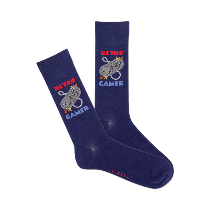 Pair of navy blue crew socks with a retro video game controller graphic and 'Retro Gamer' text. Red, white and grey details. }}