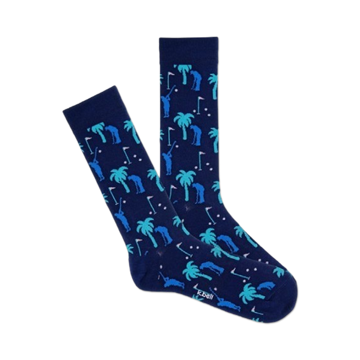 Pair of navy blue crew socks with a repeating pattern of teal palm trees and golfers. Fun and playful design. }}
