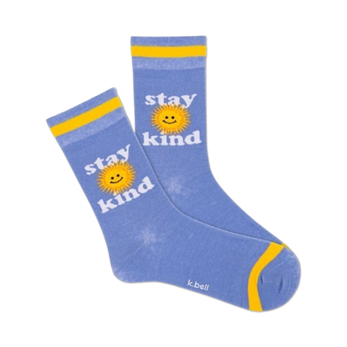 A pair of blue crew socks with a yellow sun and 'Stay Kind' text. Yellow cuffs add a pop of color.  A feel-good message for everyday wear! }}