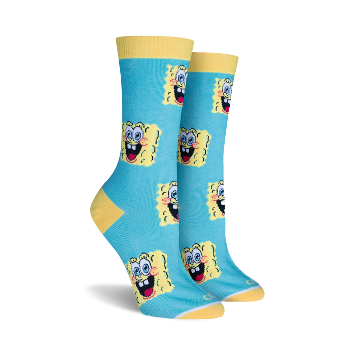 Pair of women's crew socks in teal with yellow and white Spongebob Squarepants faces. Yellow cuff. }}