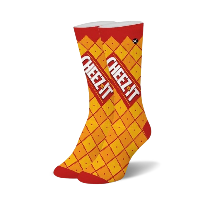 Pair of crew socks; yellow and red, with a repeating pattern of Cheez-It crackers and boxes. }}