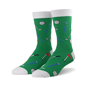 Pair of green crew socks with a fun golf-themed pattern. Features golf balls, clubs, tees, and flags in red, blue, and black.