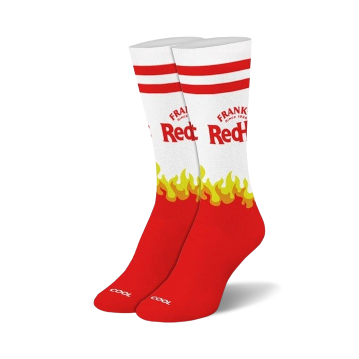 A pair of red and white crew socks. The socks feature the Frank's RedHot logo and yellow flames. }}