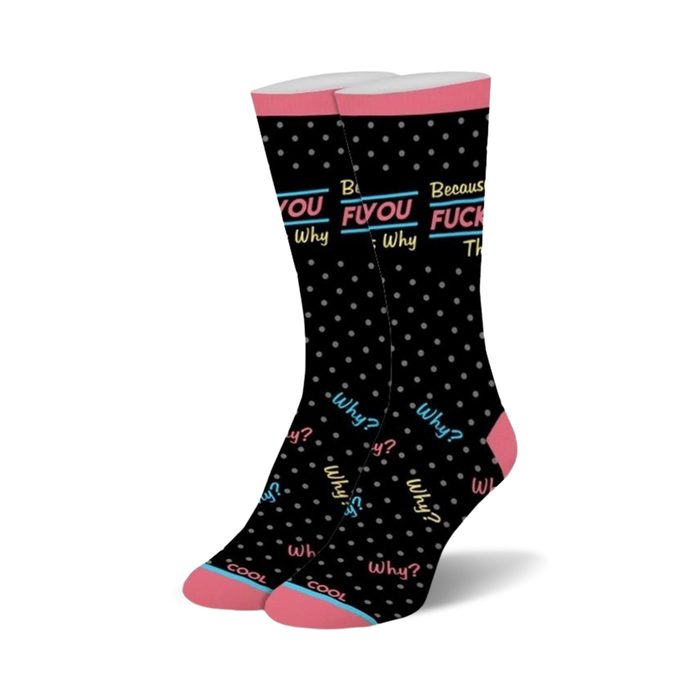 A pair of black crew socks with pink cuffs. They feature the phrase 'Fuck You That's Why' and a polka dot pattern. The words 'why?' are scattered across the socks in various colors. }}