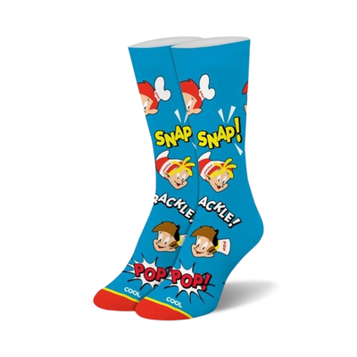 A pair of blue crew socks with Snap, Crackle, and Pop cereal mascots. Red, yellow and brown accents. Comic style design.