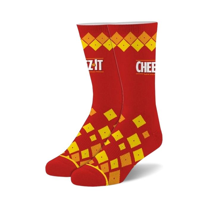 Pair of red crew socks featuring a repeating pattern of yellow Cheez-It crackers. The Cheez-It logo is visible on the socks. }}