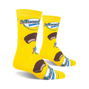 Lifestyle shot of two MoonPie socks on a black background.