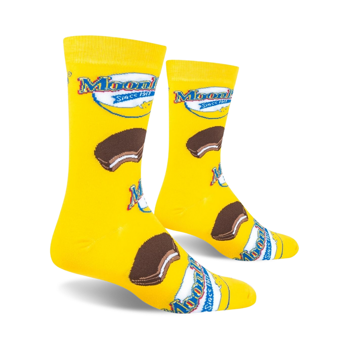 Lifestyle shot of two MoonPie socks on a black background.