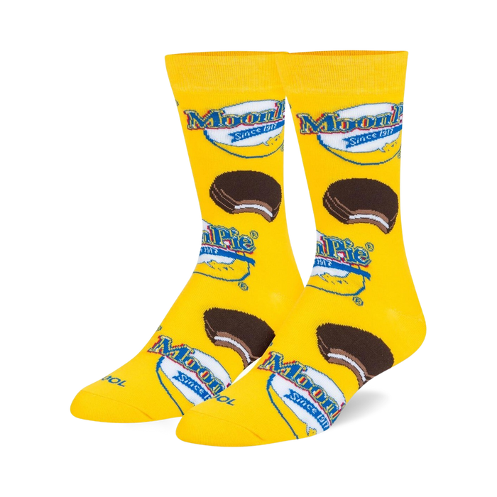 Pair of yellow crew socks with a MoonPie design. Features the MoonPie logo and images of the iconic chocolate-covered marshmallow sandwich cookie.