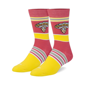 Pair of crew socks in pink and yellow with horizontal stripes and the Warheads candy logo.