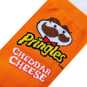 Close-up detail shot of the Pringles Cheddar Cheese logo and Mr. Pringle's face on the sock.