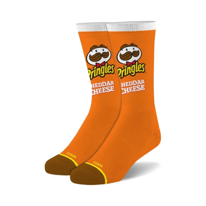 Pair of orange crew socks with the Pringles Cheddar Cheese logo and Mr. Pringle's mustache. White accents and brown heel.