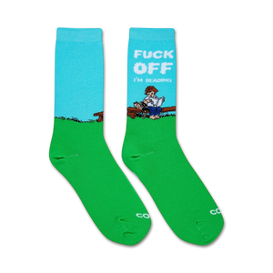Pair of crew socks in teal and green.  Feature a graphic of a person reading on a bench with the text: 'Fuck Off I'm Reading'.
