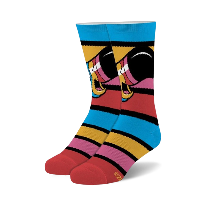 Pair of crew socks with horizontal stripes in pink, yellow, blue, and black. A retro cartoon-like design is featured on the socks. }}