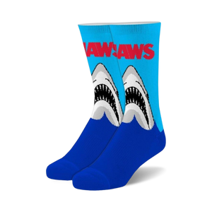 Pair of fuzzy crew socks; blue and light blue with Jaws logo and graphic of two great white sharks emerging from water.