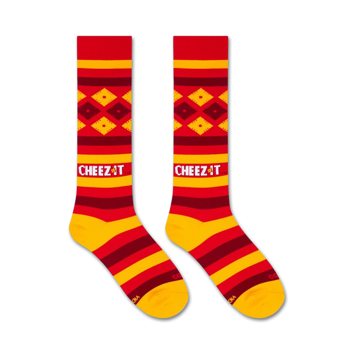 A pair of red and yellow socks with a Cheetos logo on the side.
