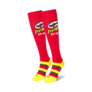 red knee high socks with a yellow and brown striped section at the top. features a pattern of the pringles logo with the pringles mascot, julius pringles.  