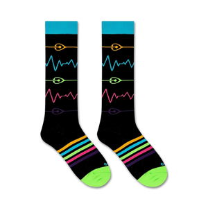A pair of black socks with a colorful pattern of sound waves on the front. The socks have a green toe and heel, and the top cuff is blue.