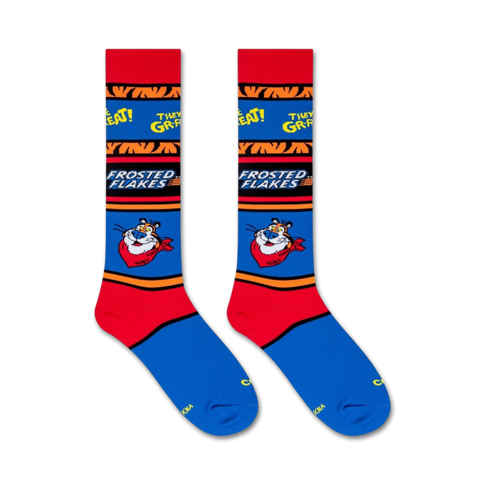 A pair of red and blue socks with the Frosted Flakes logo on them. The logo features Tony the Tiger, the mascot for Frosted Flakes, and the words 