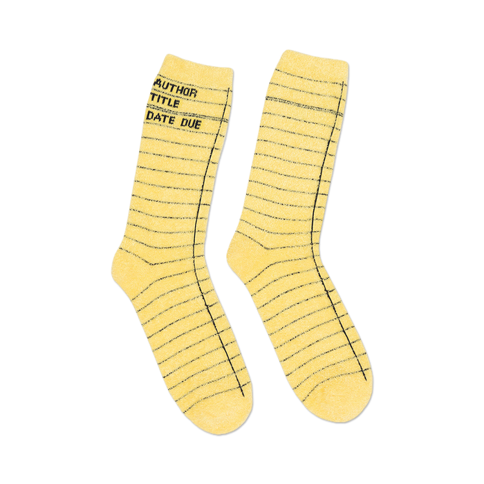 Pair of cozy yellow crew socks with a black library card design; 'Author, Title, Date Due' is printed on the side.