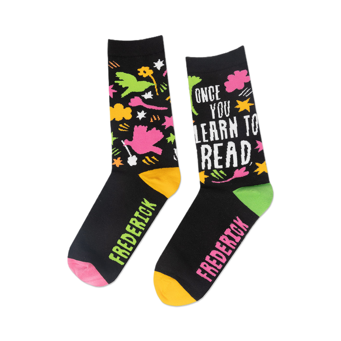 Close-up detail shot of the sock's design, highlighting the playful illustrations and text.