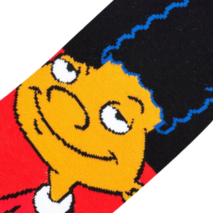 Flatlay showcasing a pair of Hey Arnold! Gerald crew socks.