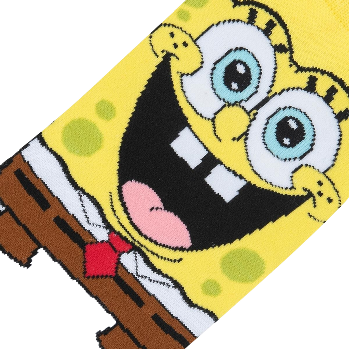 Close-up detail shot of Spongebob's smiling face on the socks, highlighting the vibrant colors and intricate design.