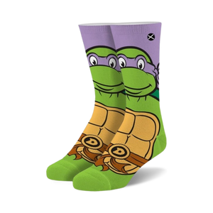 Pair of crew socks featuring Donatello from TMNT.  Purple, green, and orange design with Donatello's face and shell.
