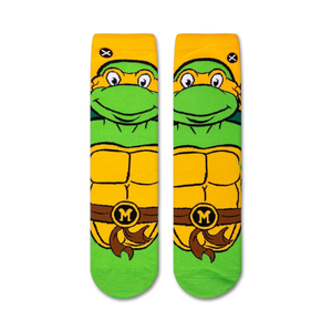 Flatlay showcasing a pair of TMNT Michelangelo crew socks, highlighting the design detail from the top.