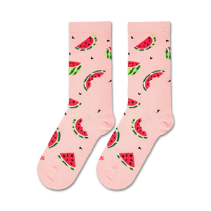 A pink sock with a pattern of watermelon slices.