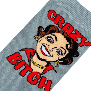 Close-up detail shot focusing on the cartoon woman's face and 'Crazy Bitch' text on the sock.