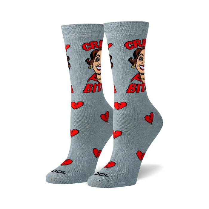 Pair of women's crew socks; light grey with a sassy cartoon woman graphic, 'Crazy Bitch' text, and red broken heart accents.
