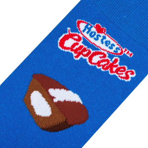 Close-up detail shot of Hostess Cupcakes sock highlighting the Hostess logo and cupcake graphic.