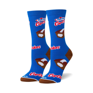 Pair of blue crew socks with Hostess Cupcakes design. Features brown and white cupcake illustrations and Hostess logo.