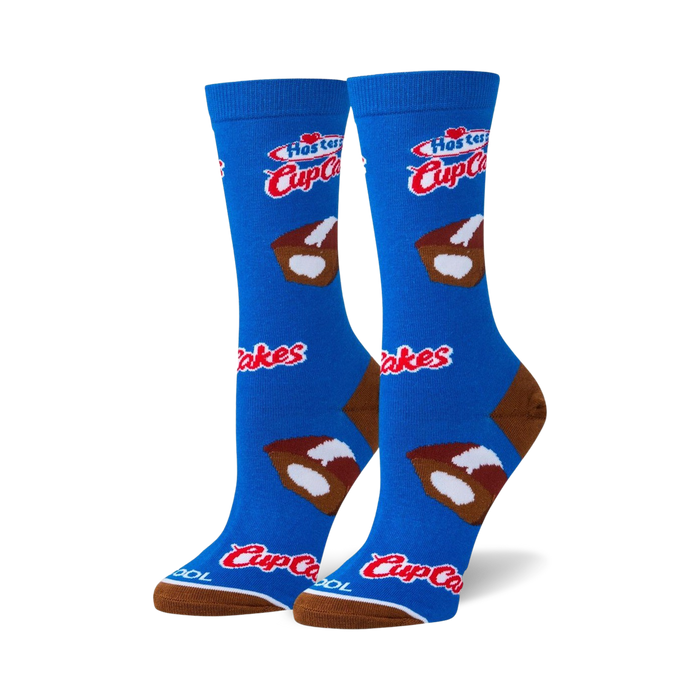 Pair of blue crew socks with Hostess Cupcakes design. Features brown and white cupcake illustrations and Hostess logo.
