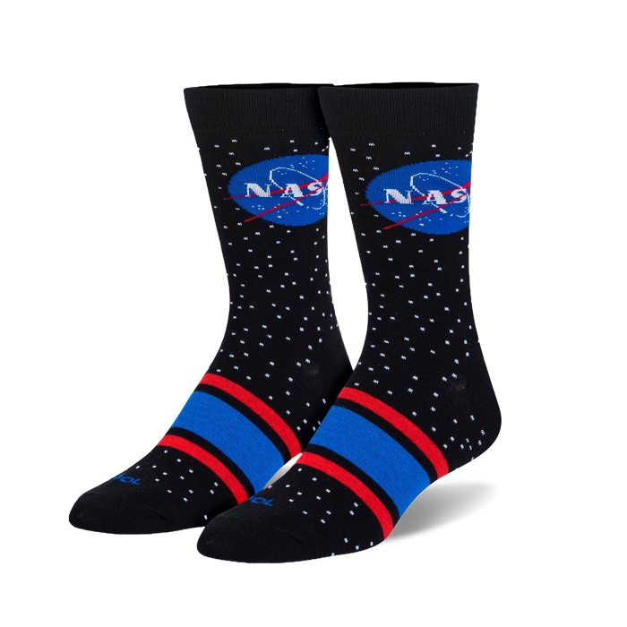 A pair of black crew socks with a red and blue stripe at the ankle. The socks feature a white dotted pattern and the NASA logo. }}