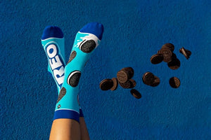 Lifestyle shot focusing on the socks and shoes, emphasizing how the socks look when worn.