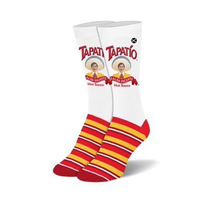 Pair of crew socks with Tapatio hot sauce branding. White background with red and yellow stripes at the bottom and Tapatio logo featuring the man in a sombrero.