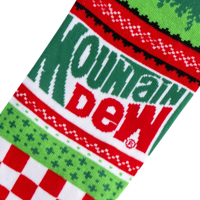 Close-up detail shot of the Mountain Dew Ugly Sweater socks, highlighting the knitted texture and Mountain Dew logo.