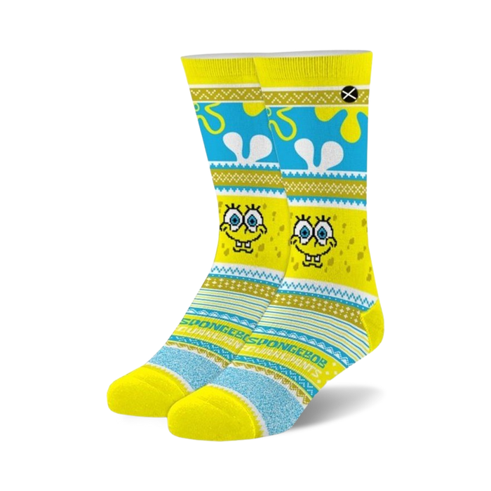Pair of SpongeBob Squarepants crew socks. Yellow, blue, and gold design with SpongeBob's face and a fair isle pattern. }}