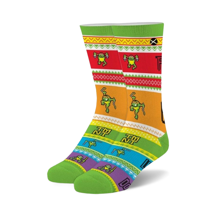 Crew socks in green, red, yellow, and blue feature a pixelated Teenage Mutant Ninja Turtles ugly sweater design.
