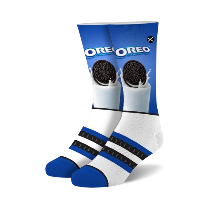 Pair of crew socks in blue, white, and black featuring an Oreo cookie dunked in milk graphic.