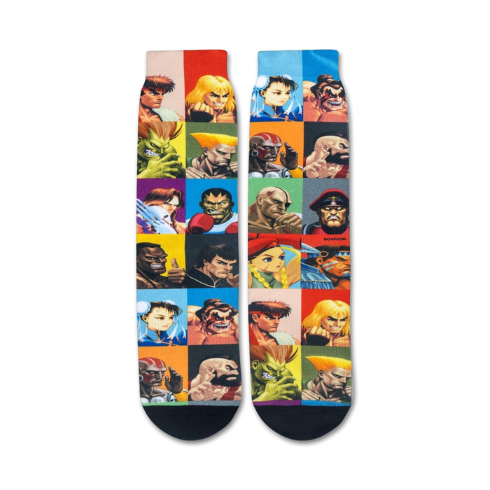 A pair of black socks with colorful portraits of characters from the Street Fighter video game series.