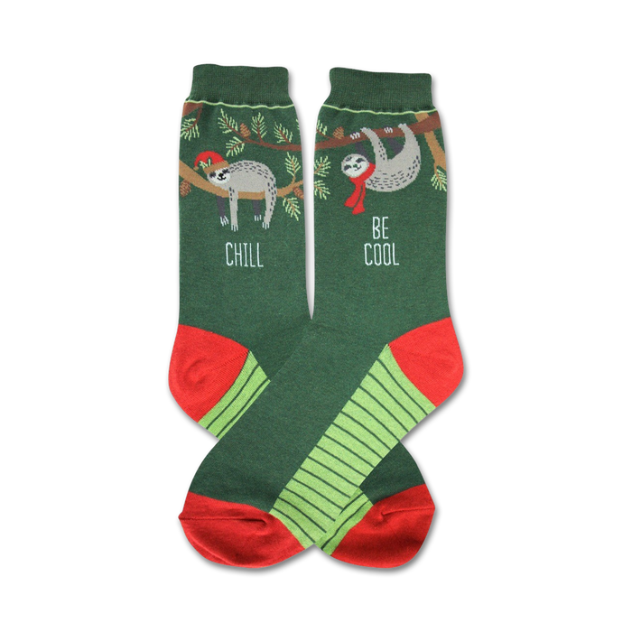 Crew socks in green with lime green stripes and red cuffs. Feature two sloths; one wears a Santa hat, the other a scarf. Text reads 'Chill' and 'Be Cool'. }}
