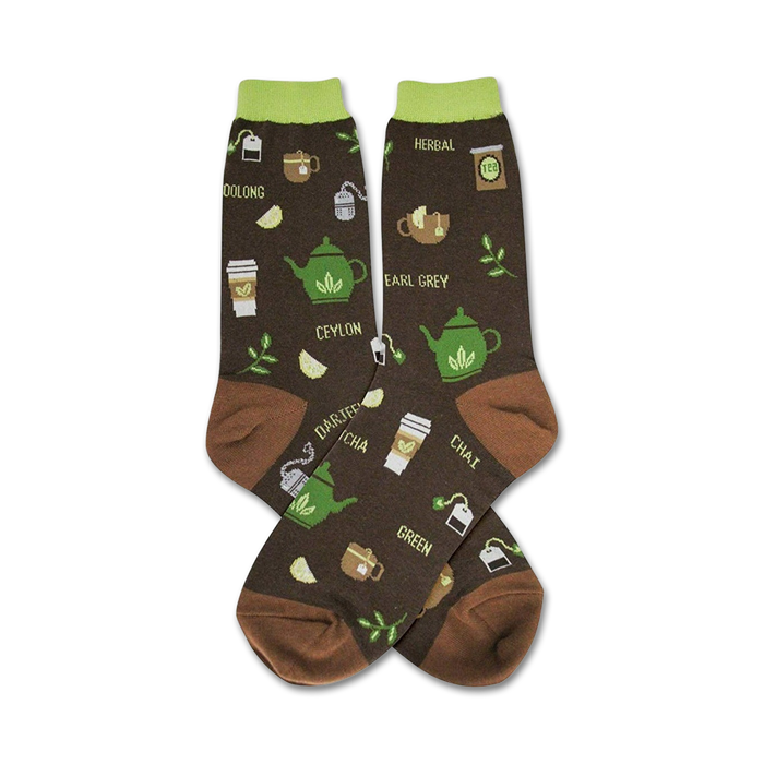 Pair of brown crew socks with green tea-themed illustrations: teapots, tea bags, and cups. Names of different teas are also printed on the socks. }}