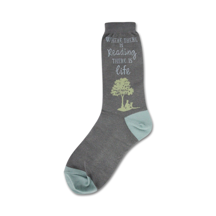 Gray crew socks with teal accents. Design features a quote: 'Where there is reading there is life,' and an illustration of a person reading under a tree. }}