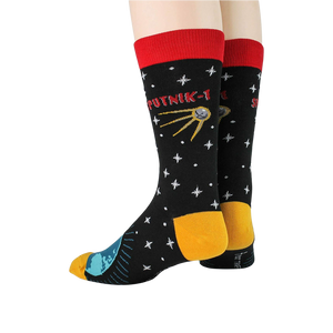 Rear view of Sputnik socks on a model's legs, emphasizing the sock's design elements.