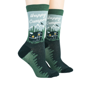 Lifestyle image showing Happy Camper socks on a person's feet.