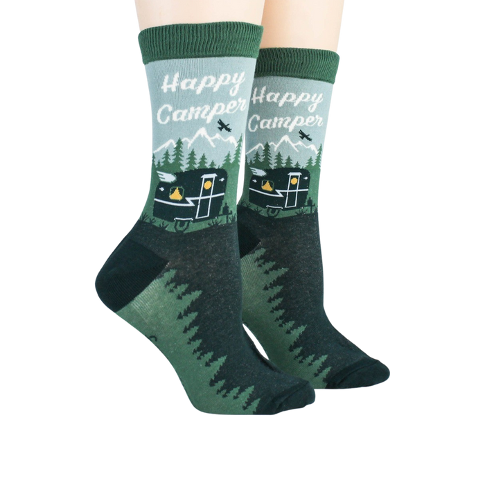 Lifestyle image showing Happy Camper socks on a person's feet.